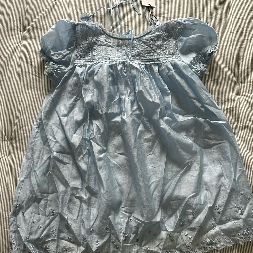 Light blue baby doll dress, slightly see thru.